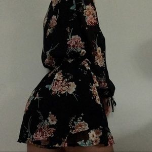 black floral long sleeved romper
